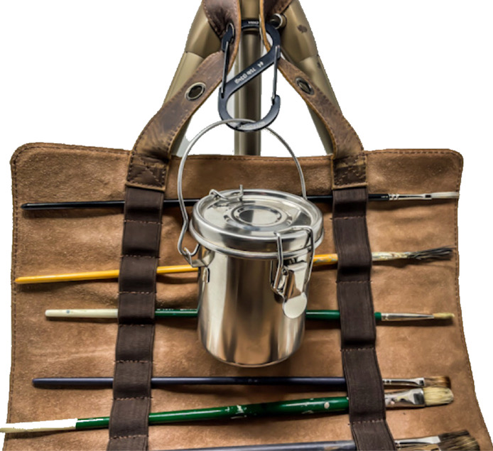 Close up of brush organizer used on tripod with variable loop adjustment shown